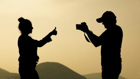 Silhouette of a tourist couple at Chandil Dam